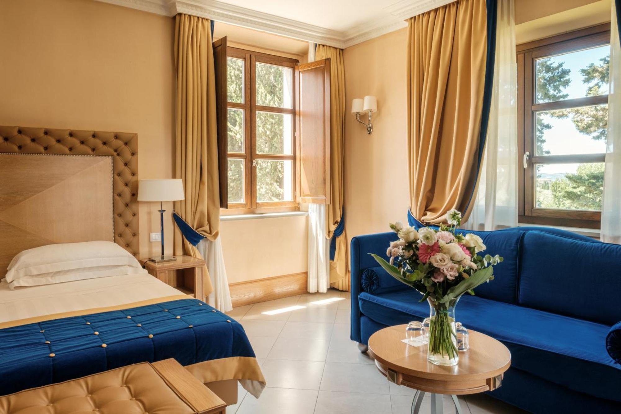 Villa Tolomei Hotel & Resort Флоренція Екстер'єр фото A room at the hotel