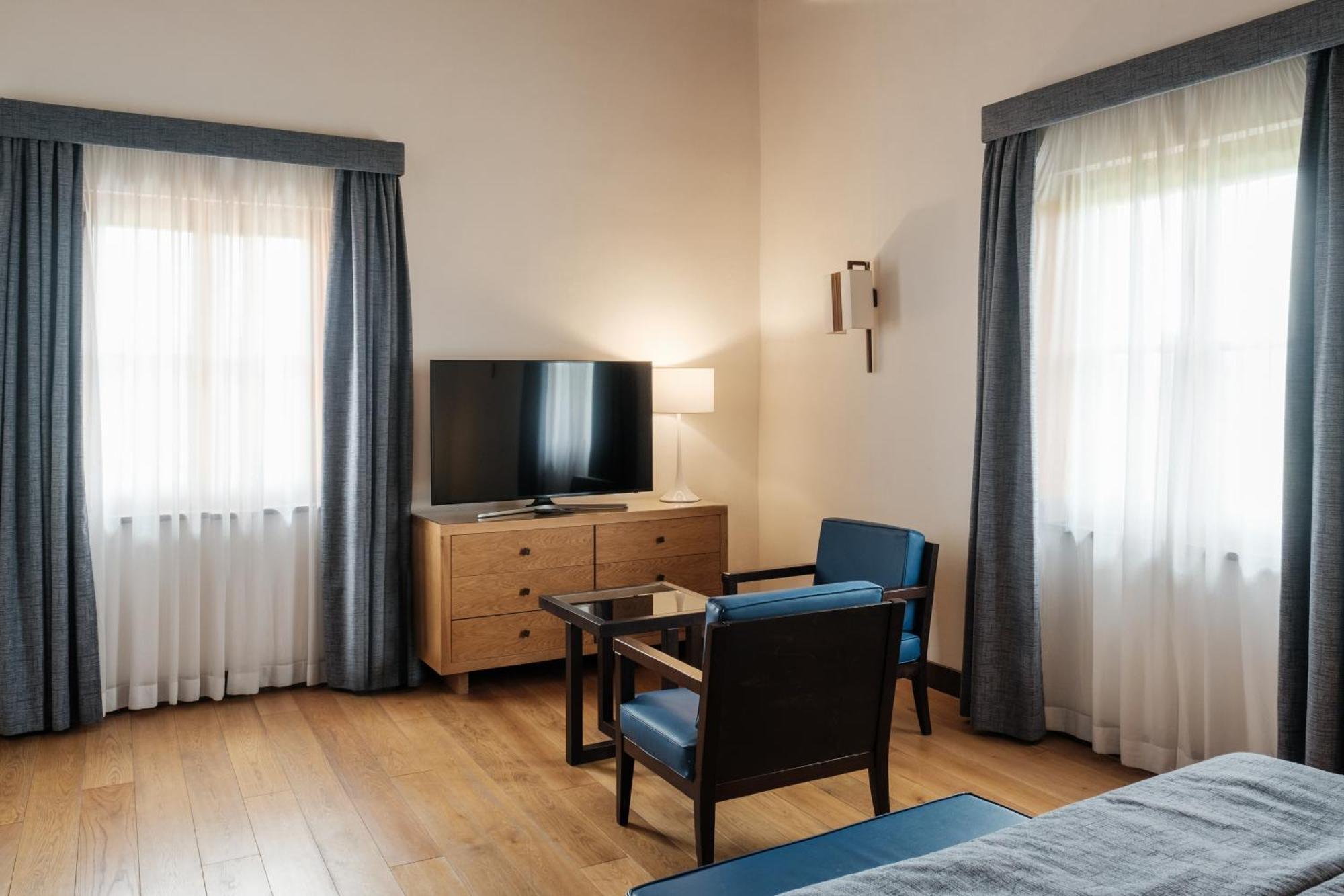 Villa Tolomei Hotel & Resort Флоренція Екстер'єр фото A room at the hotel