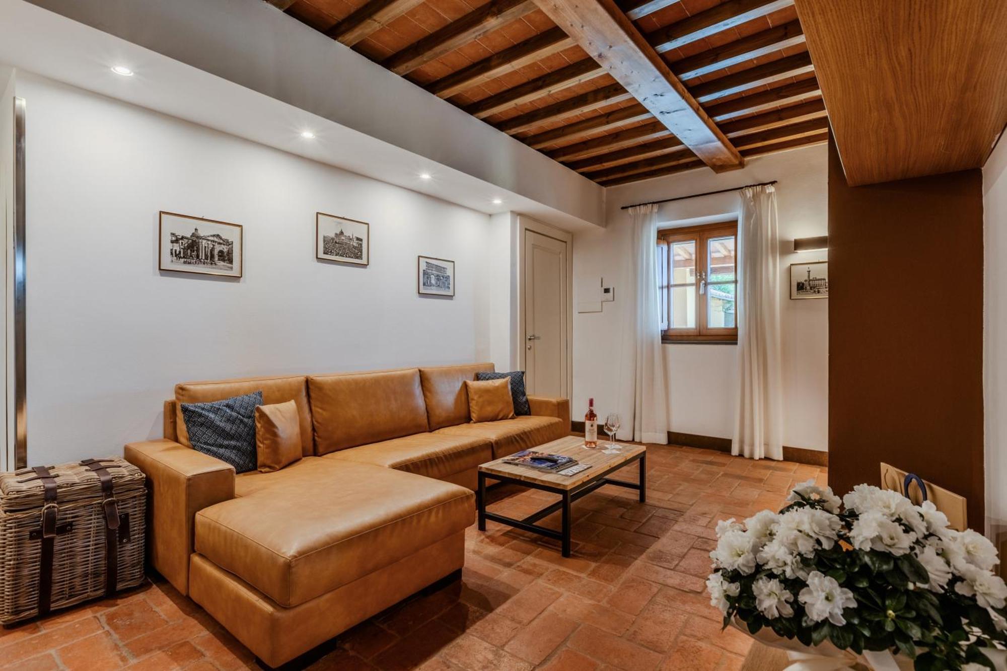 Villa Tolomei Hotel & Resort Флоренція Екстер'єр фото A living room in a house