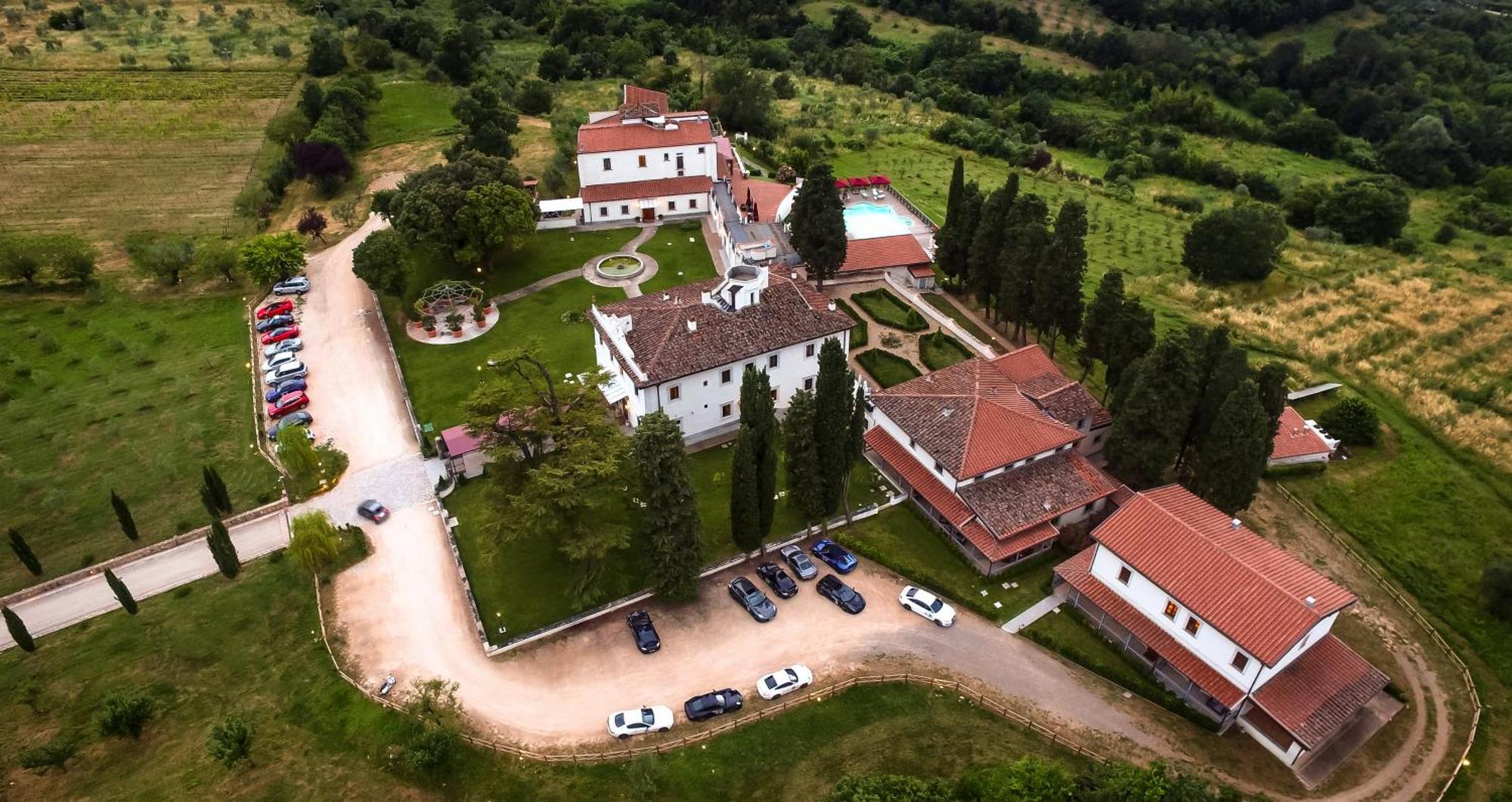Villa Tolomei Hotel & Resort Флоренція Екстер'єр фото Aerial view of the monastery